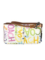 Signature Cloth Zip Top Wristlet