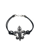 Sterling fleur de lis on cord bracelet