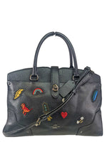 R Mercer 57078 Souvenir Embroidery Satchel retails $495